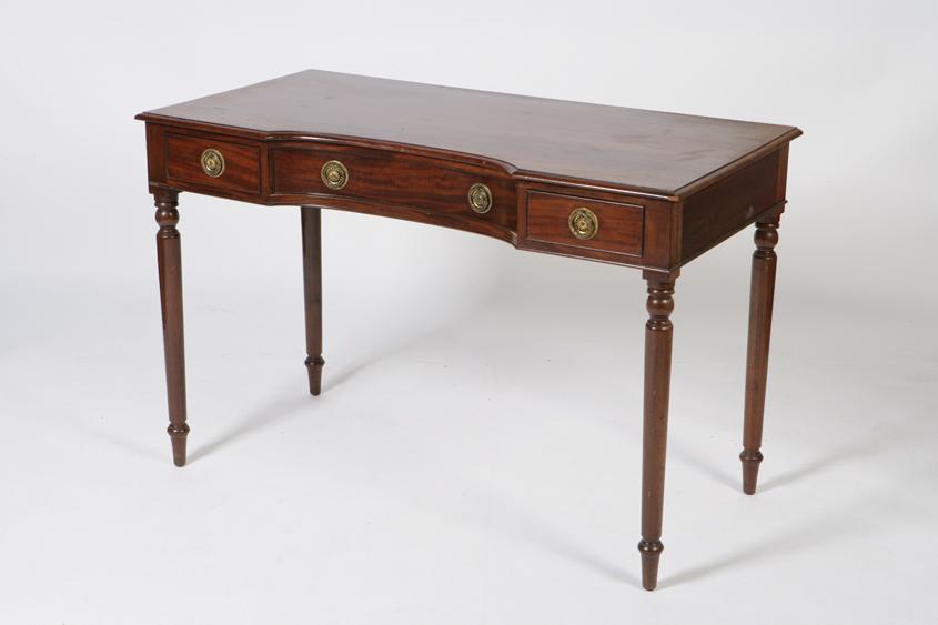 Appraisal: A LATE REGENCY MAHOGANY DRESSING TABLE the rectangular top with