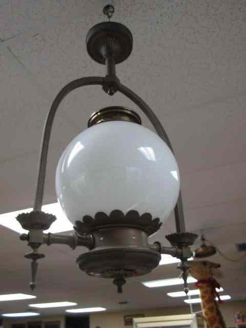 Appraisal: Vintage spelter deco style globe chandelier White globe shade Measures