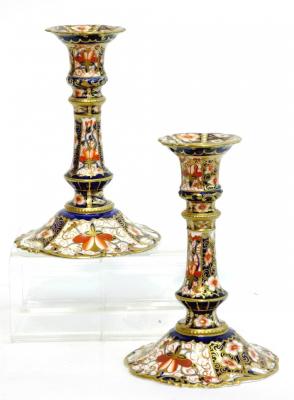 Appraisal: A PAIR OF ROYAL CROWN DERBY PORCELAIN CANDLESTICKS the sconce