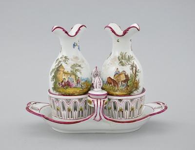 Appraisal: A French Faience Cruet Set and Stand Consisting of two