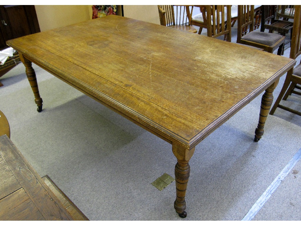 Appraisal: Edwardian oak boardroom table on turned supports