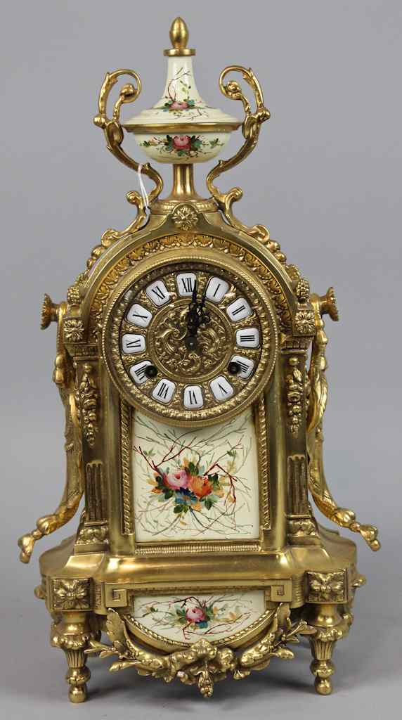 Appraisal: LOUIS XVI STYLE GILT BRONZE MANTEL CLOCK the circular face