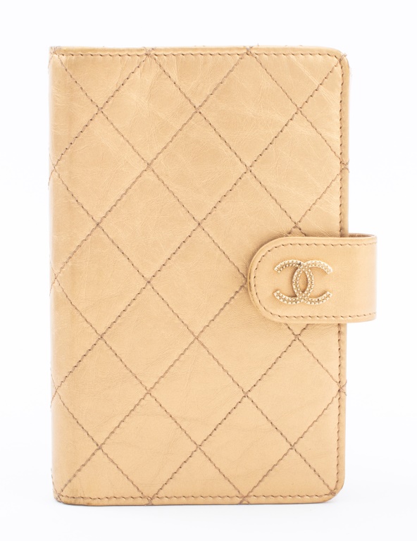 Appraisal: CHANEL QUILTED GOLD-TONE LEATHER WALLET Chanel quilted gold-tone leather wallet