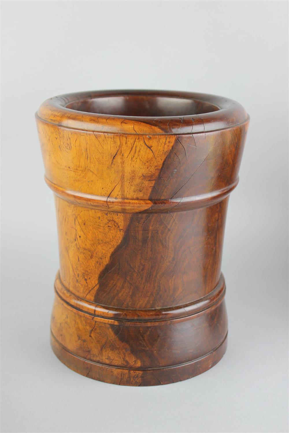 Appraisal: LIGNUM VITAE CARVED MORTAR th Century of slightly waisted shape