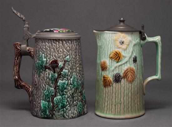 Appraisal: German pewter-mounted majolica stein with a porcelain inset top and