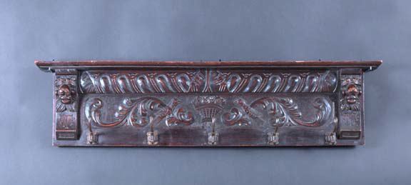 Appraisal: Continental Carved and Dark-Stained Oak Five-Hook Coat Rack in the