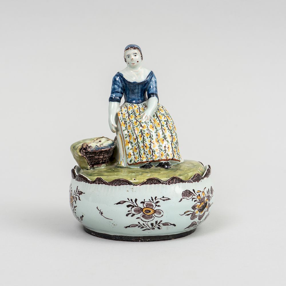 Appraisal: Dutch Delft Figural Butter Tub and Cover With underglaze manganese