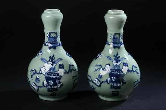 Appraisal: PAIR CHINESE BLUE AND CELADON PORCELAIN VASES Qing Dynasty Painted