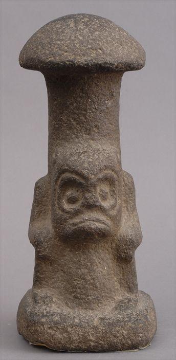 Appraisal: MEXICAN LATE CLASSICAL CARVED STONE FIGURE The seated monkey deity