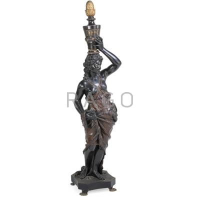 Appraisal: VENETIAN PARCEL-GILT BLACKAMOOR TORCHIERE Carved wood polychrome decoration late th