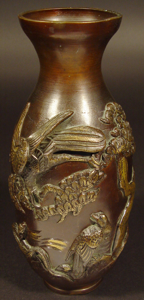 Appraisal: Large Japanese bronze vase cast in relief with serpents birds