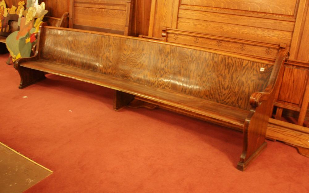 Appraisal: AN OAK CHURCH BENCH American c slightly curved H x