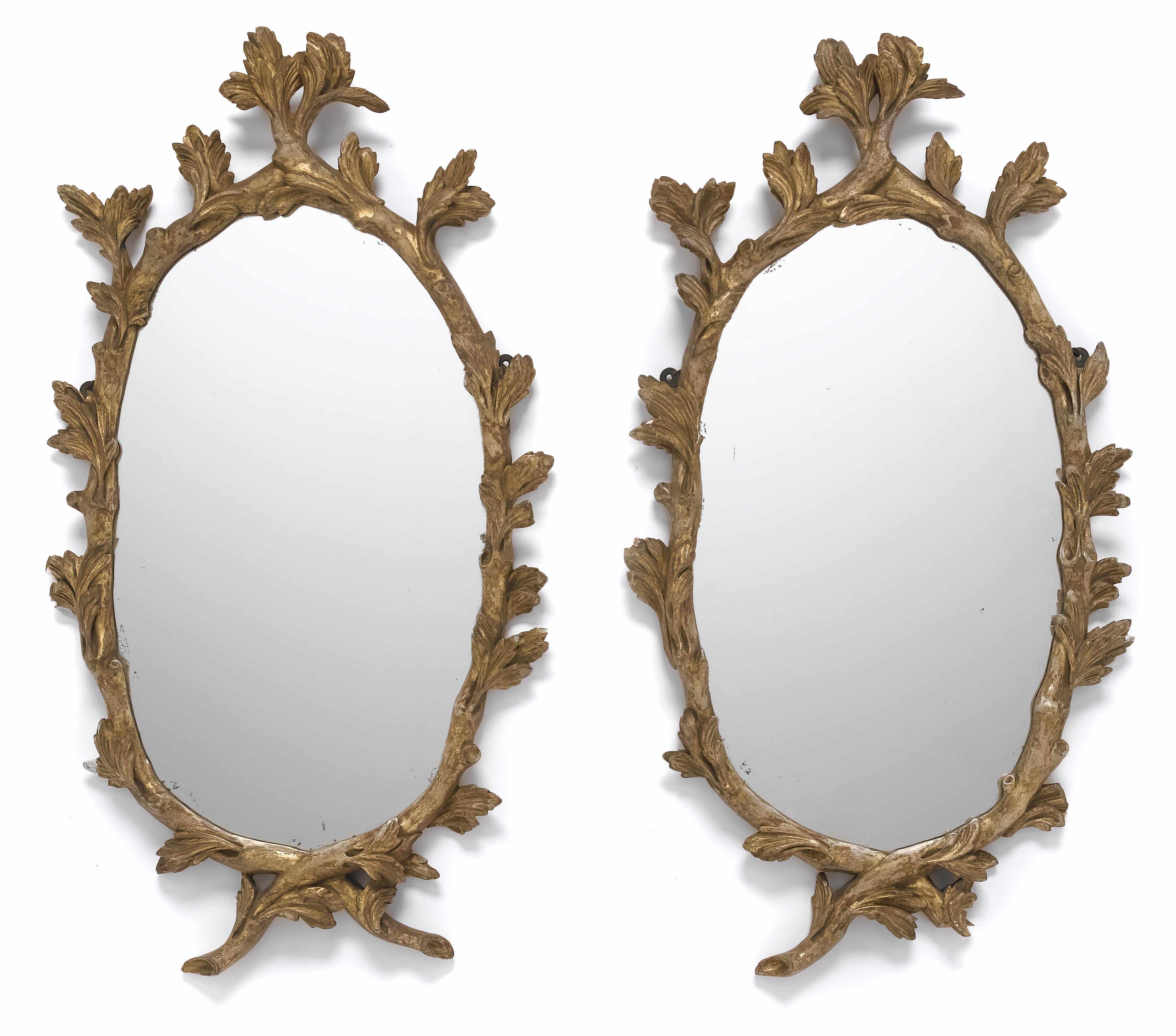 Appraisal: A pair of Italian Rococo style carved giltwood mirrors second