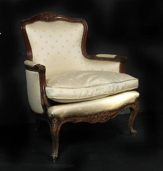 Appraisal: A Louis XV style walnut bergere early th century height