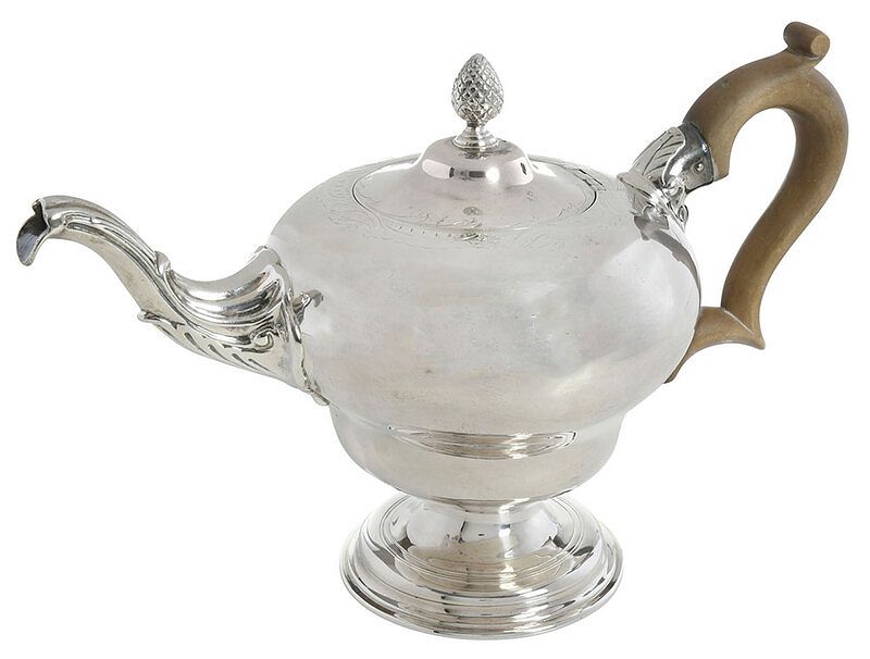 Appraisal: George III English Silver Teapot London round body engraved decoration