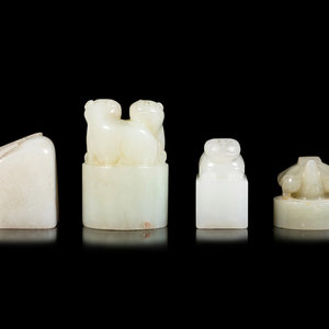 Appraisal: Four Chinese Celadon Jade Seals comprising one plain example and