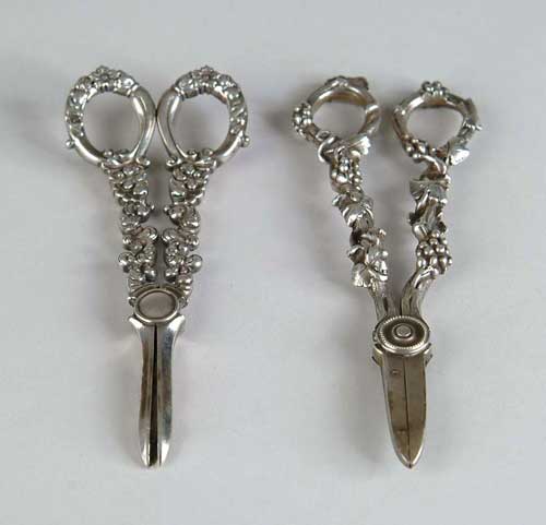 Appraisal: TWO SILVER PLATED GRAPE SHEARS One marked Tiffany Co Makers