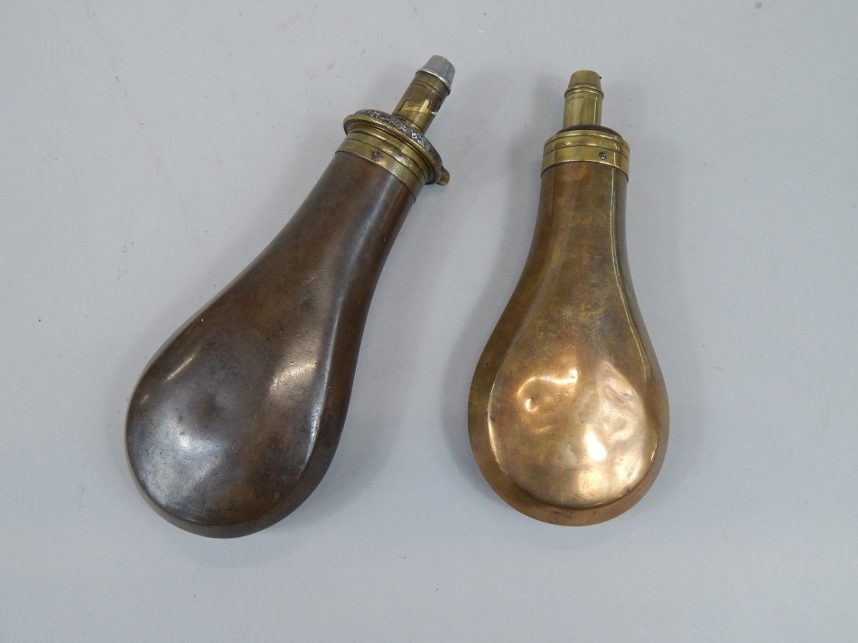 Appraisal: Two copper and brass powder flasks one stamped Dixon and