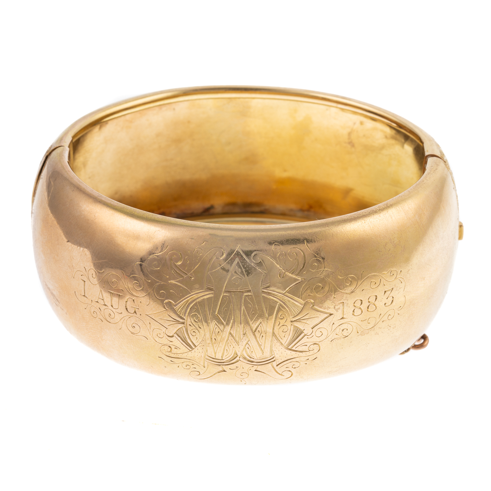 Appraisal: AN VICTORIAN ENGRAVED HINGED BANGLE IN K K yellow gold