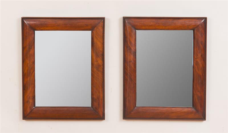 Appraisal: PAIR OF CUSHION-MOLDED MAHOGANY MIRRORS Both x in Property from