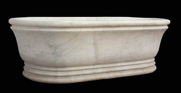 Appraisal: A carved white marble cistern The rounded edge over an