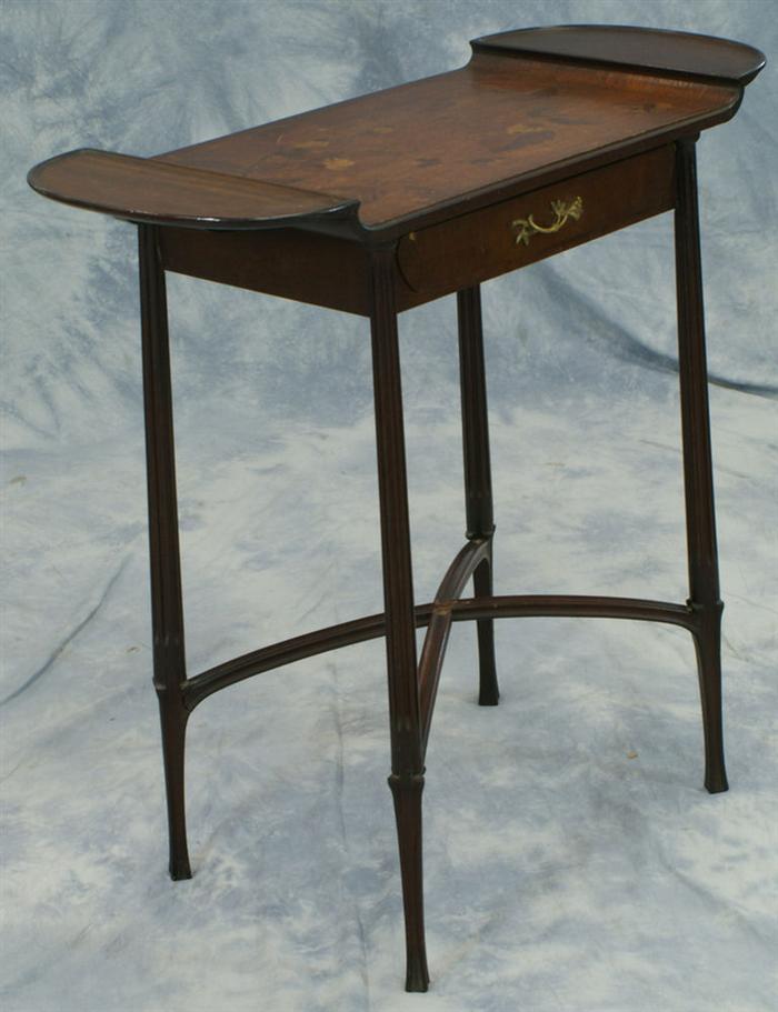 Appraisal: Floral marquetry inlaid side table in the style of Majorelle