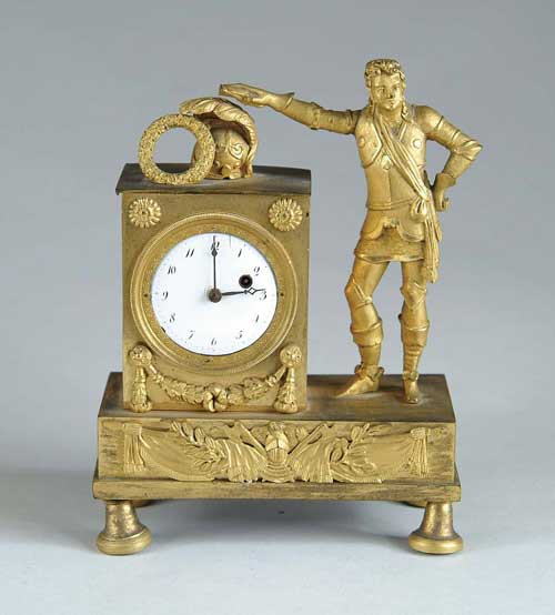 Appraisal: MINIATURE EMPIRE CLOCK WITH NAPOLEON LIKE FIGURE Round white enamel