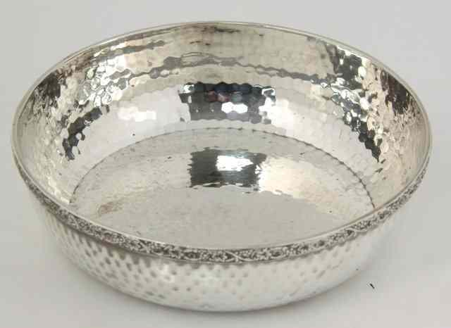 Appraisal: A silver bowl Chester the rim embossed fruiting vines the