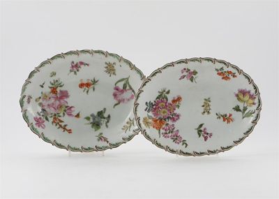 Appraisal: Two Chelsea oval dishes with feather moulded rims painted with