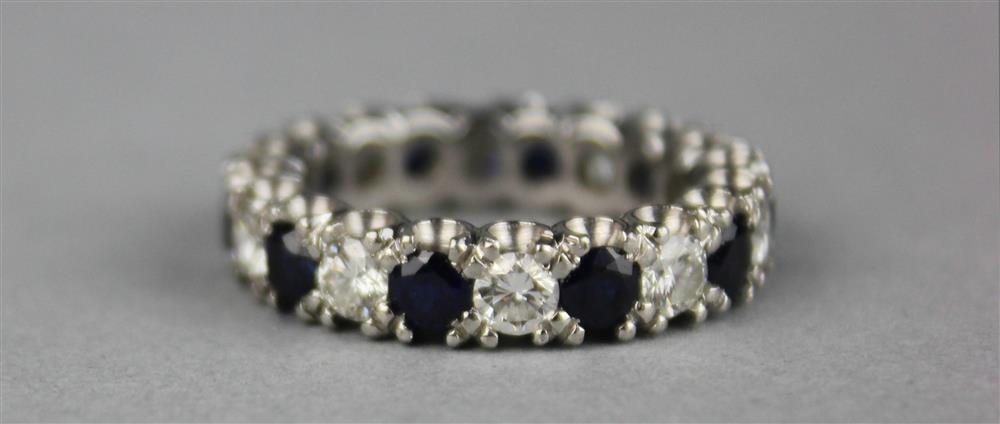 Appraisal: PLATINUM DIAMOND AND SAPPHIRE ETERNITY RING the band alternates with