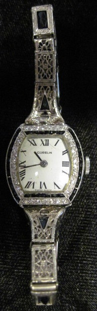 Appraisal: Lady's white gold diamond and onyx wristwatch Gubelin Rounded Square