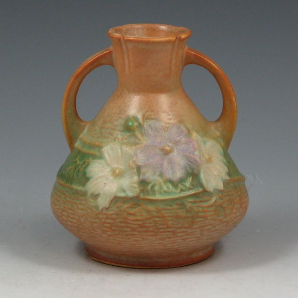 Appraisal: Roseville Cosmos handled cabinet vase in tan Marked Roseville USA