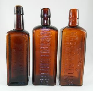 Appraisal: Bitters- Square amber- marked vertically on two panels 'Electric Bitters'