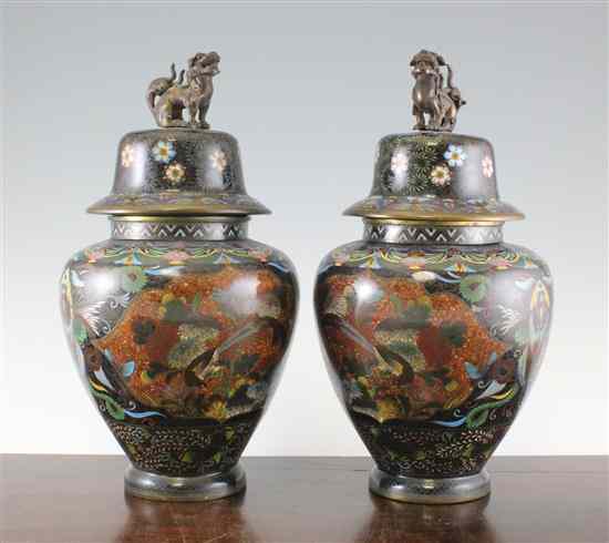 Appraisal: A pair of Japanese cloisonne enamel ovoid vases and covers