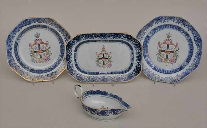 Appraisal: FOUR CHINESE EXPORT ARMORIAL PORCELAIN TABLE ARTICLES Including a sauceboat