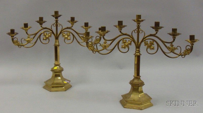 Appraisal: Pair of Gothic-style Brass Seven-Light Candelabra ht lg in