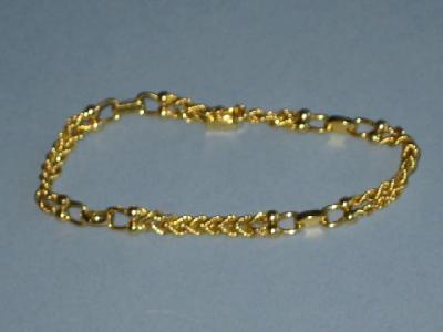 Appraisal: AN CT GOLD BRACELET with twisted rope links long gms