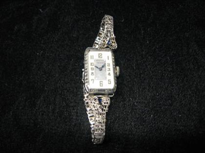 Appraisal: Lady's Elgin wristwatch karat white gold filigree wristwatch with synthetic