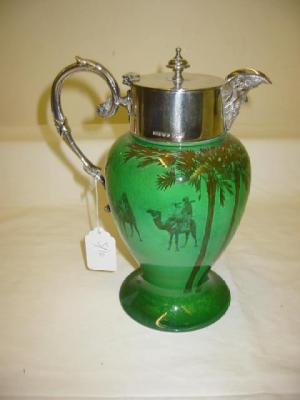 Appraisal: A ROYAL DOULTON CLARET JUG the EPNS lidded top with