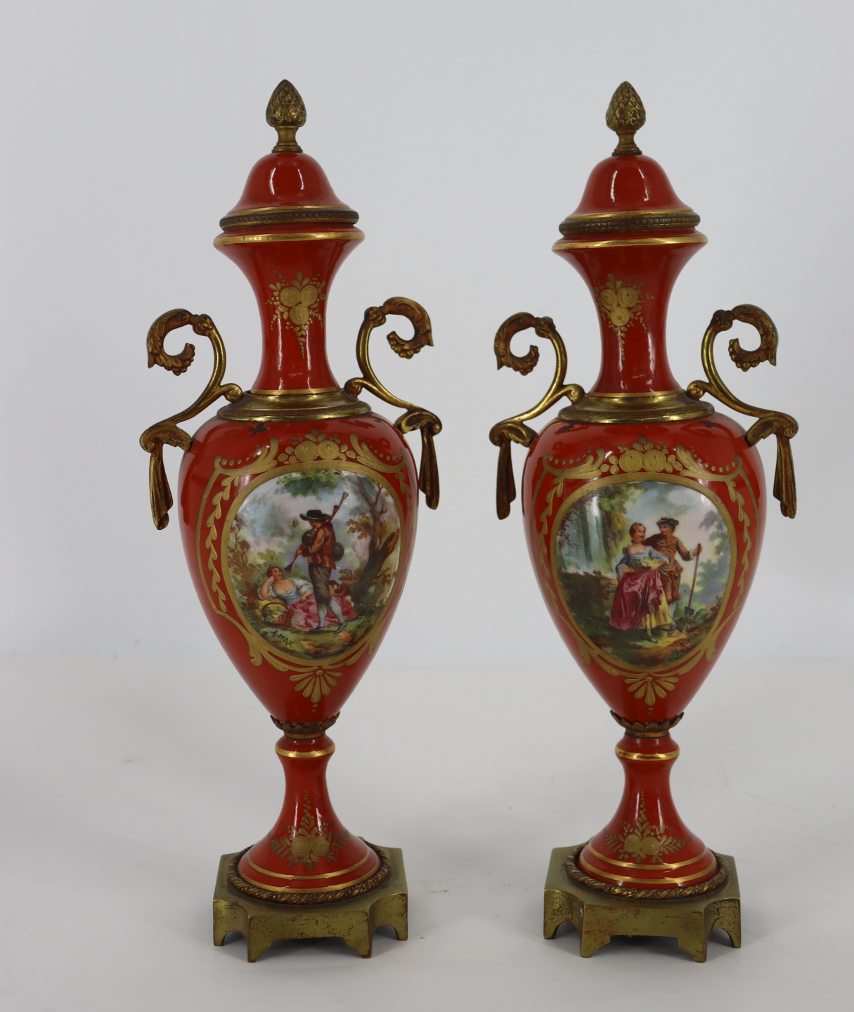 Appraisal: PAIR OF SEVRES LIDDED PORCELAIN URNS Stamped Made in France