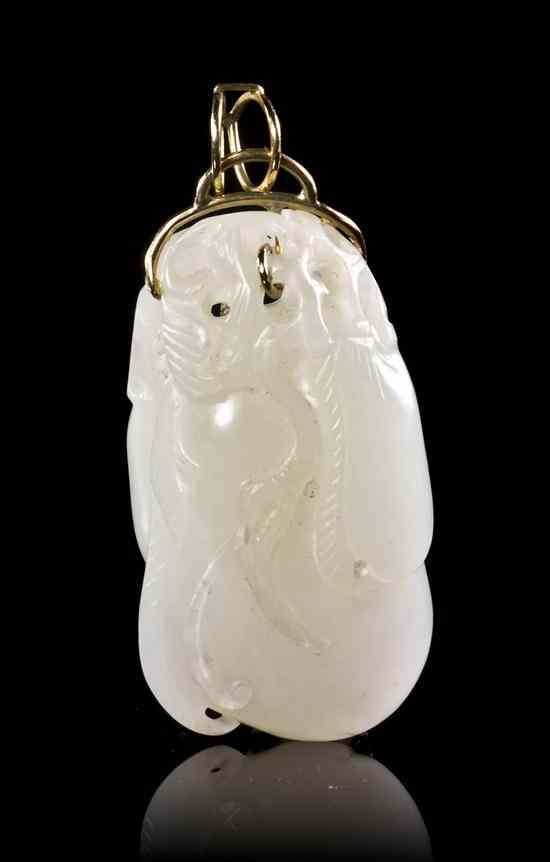 Appraisal: A White Jade Toggle in the form of hanging fruit