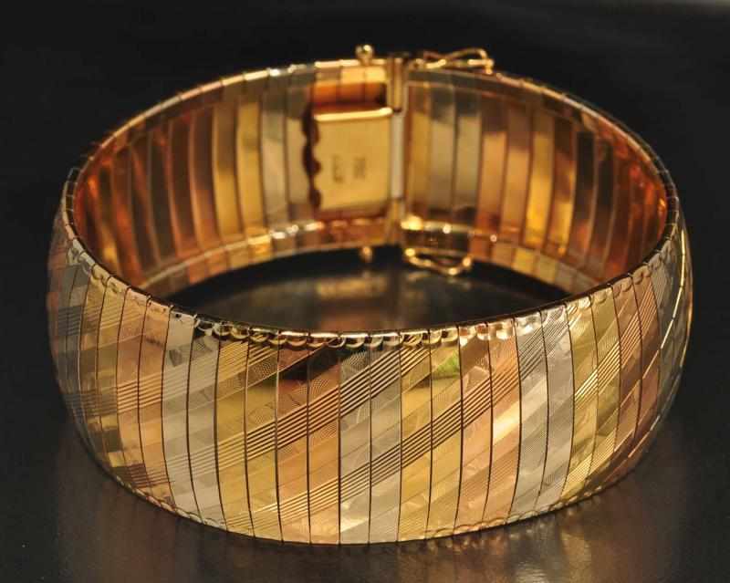 Appraisal: K Three-Tone Gold Soft Cuff Bracelet Description Weight dwt Condition