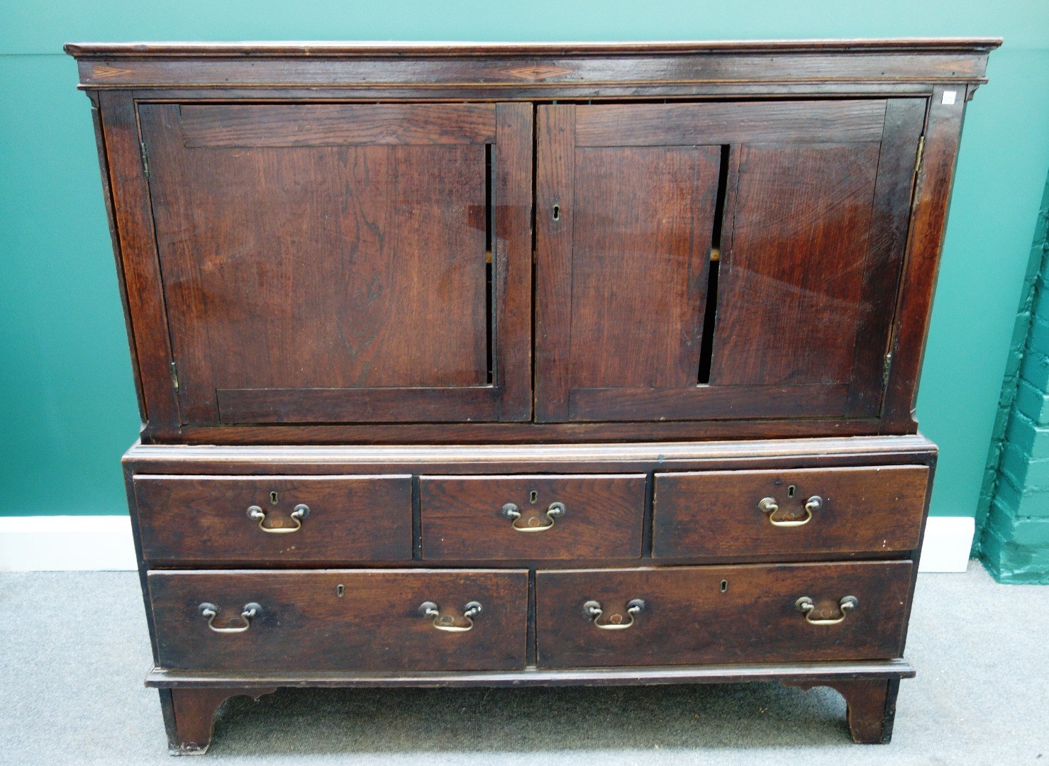 Appraisal: An th century bacon cupboard with a pair of doors