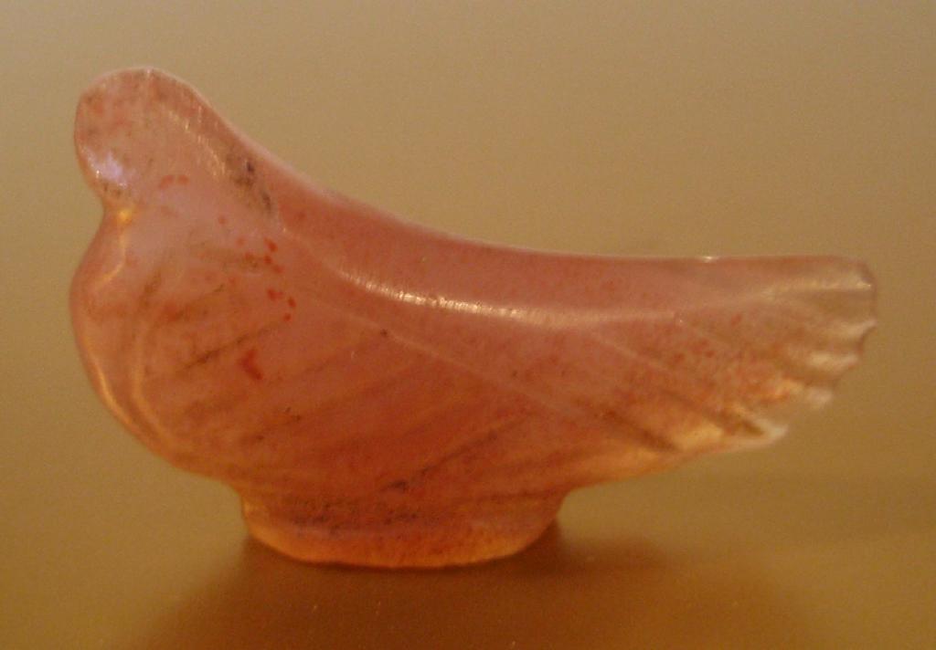 Appraisal: A carved cornelian in the form a stylized bird probably