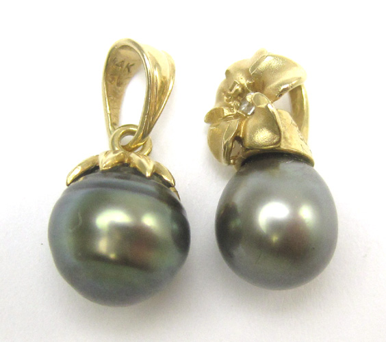 Appraisal: TWO FOURTEEN KARAT GOLD AND BLACK PEARL PENDANTS