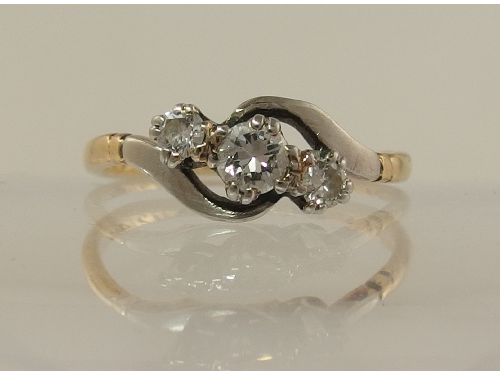 Appraisal: A three stone diamond ring of approx cts combined