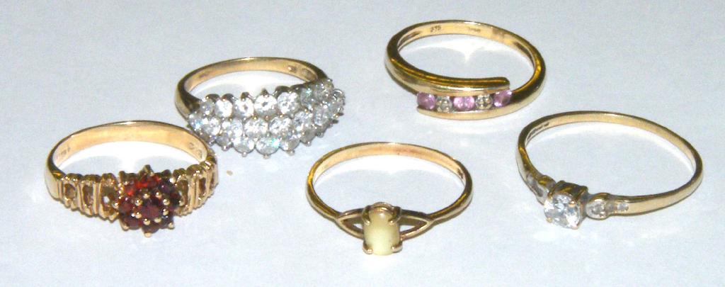 Appraisal: Five ct stone set rings grams in total