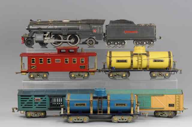 Appraisal: LIONEL E ENGINE WITH FREIGHT CARS Includes the - -