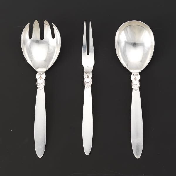 Appraisal: THREE GEORG JENSEN STERLING SILVER SERVING UTENSILS CACTUS PATTERN Elegant