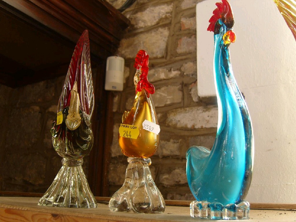 Appraisal: A collection of nine Venetian coloured glass models of cockerels